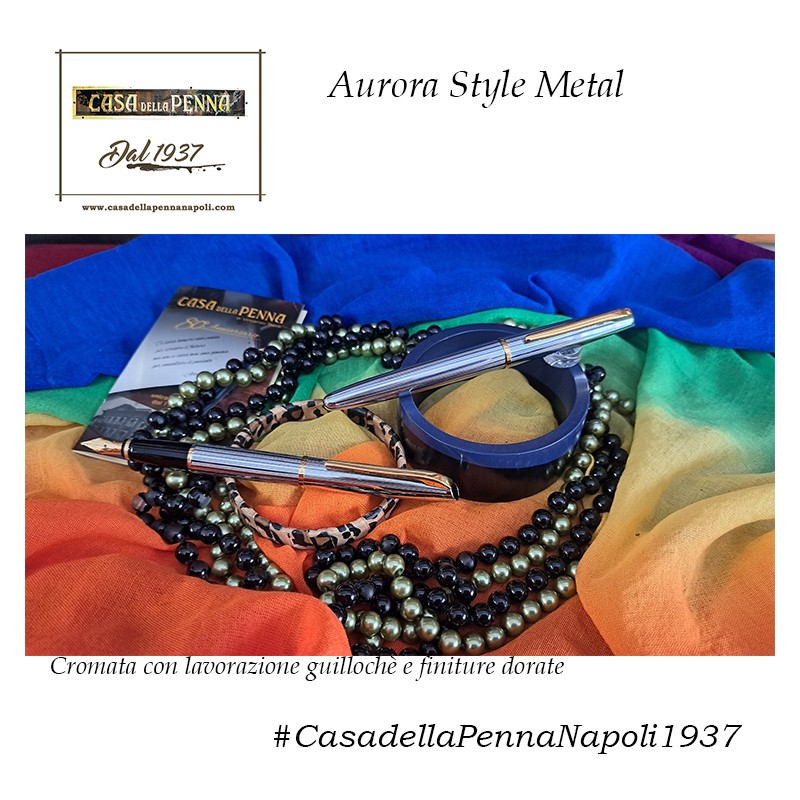 Aurora Style Metal Cromata con lavorazione guillochè e finiture dorate